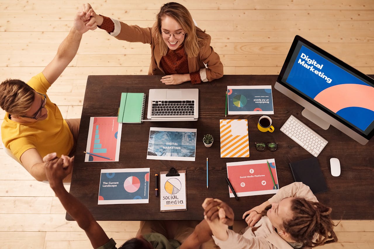 Boost-Web-Solutions-Team-celebrating-success-in-a- modern-digital-marketing-office-with-teamwork-and-collaboration-South-West-Western-Australia